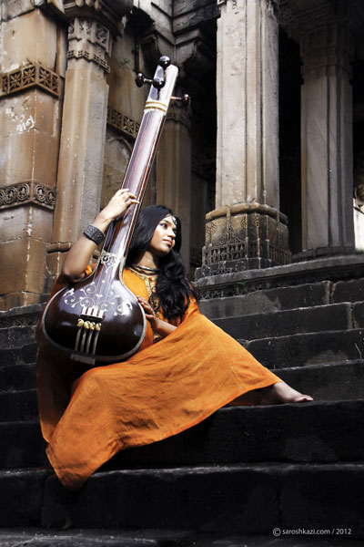 Mirande shah on a Sitar