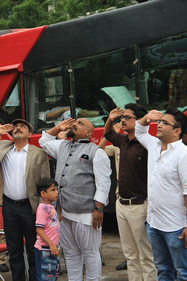 NIEM students and arvind vegda singing national anthem 