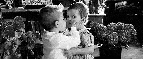 Two Childrens Kissing